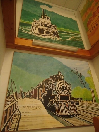 heritage mural.  3    First landing. Typical Early days transport.