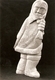 Woman walking into the wind. Serpentine h 60cm. 1990. private collection